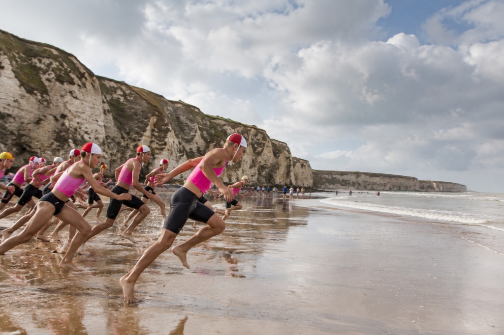 Lifesaving sport team running on the Yorkshire coast